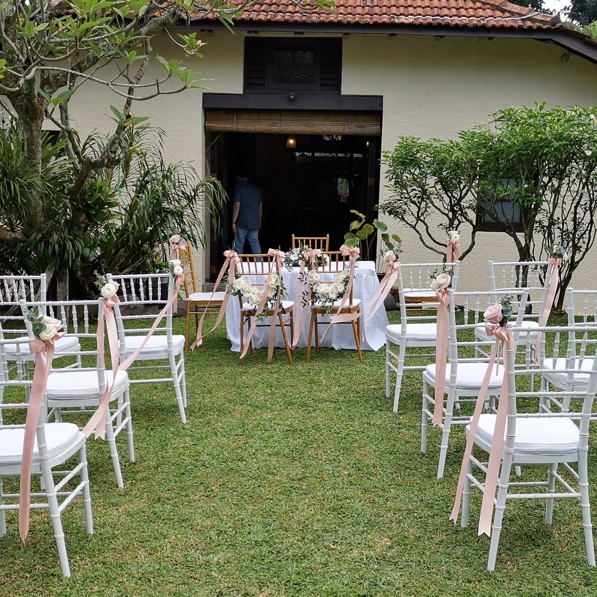 Simple private home solemnization pew tie white chairs garden ceremony pastel pink Singapore