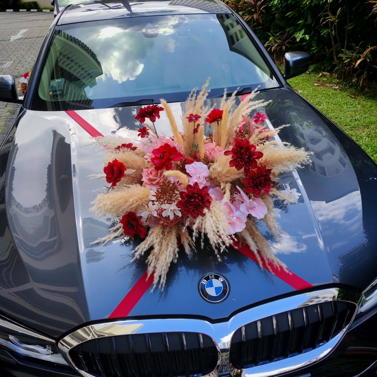 BMW rustic artificial flowers wedding car decor tropical red orange dramatic Singapore