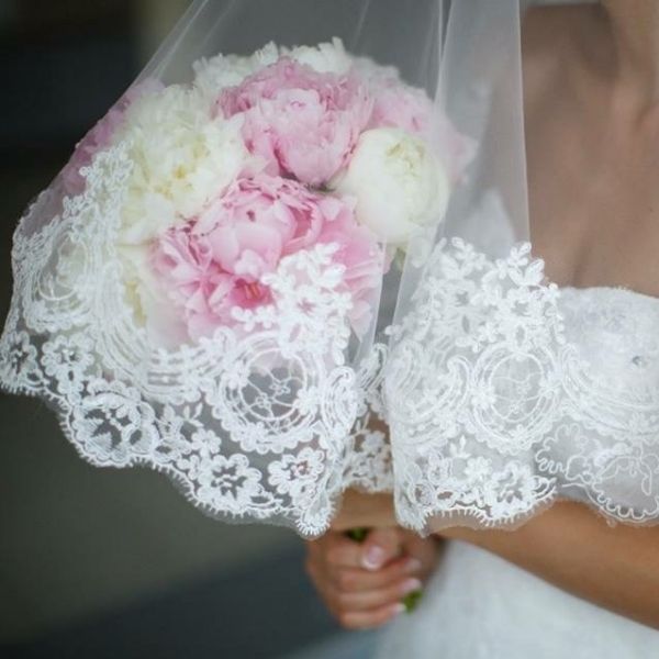 Bride holding bridal bouquet by Fleuriste Singapore wedding florist