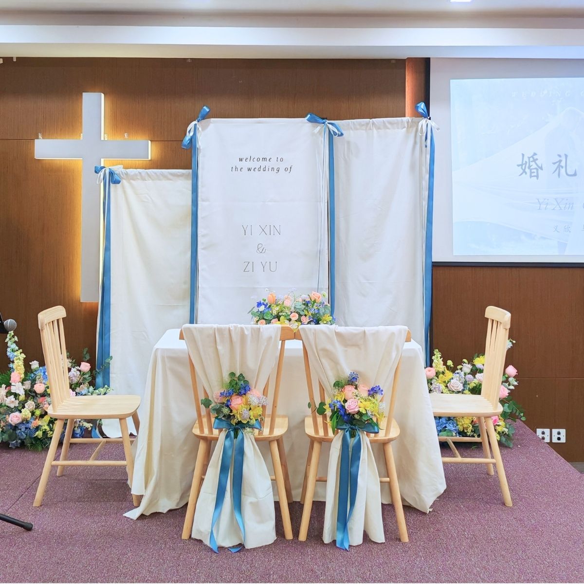 Church wedding blue solemnization floral chairbacks Singapore Fleuriste