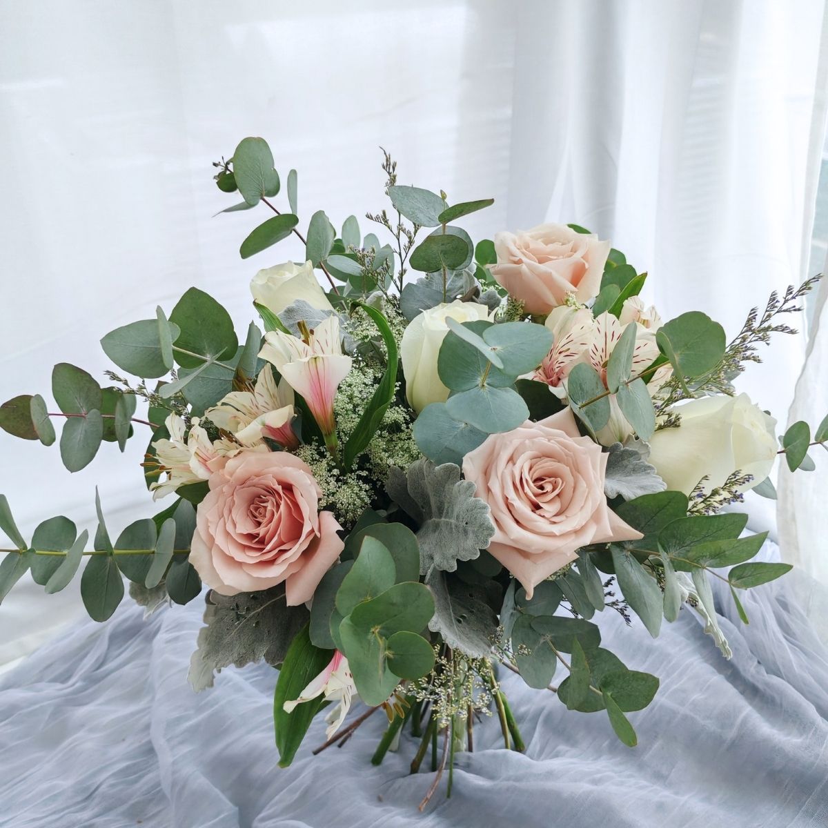 Classic bridal bouquet quicksand roses rustic eucalyptus Singapore