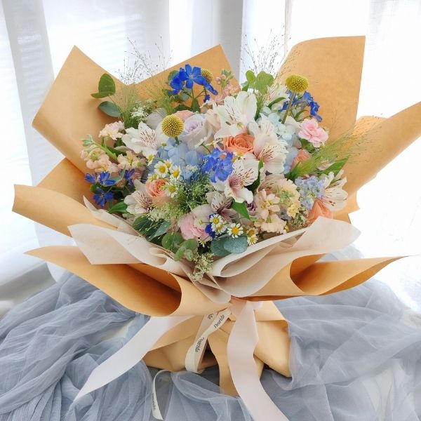 Garden style gift bouquet made at Fleuriste SkillsFuture WSQ floristry course Singapore