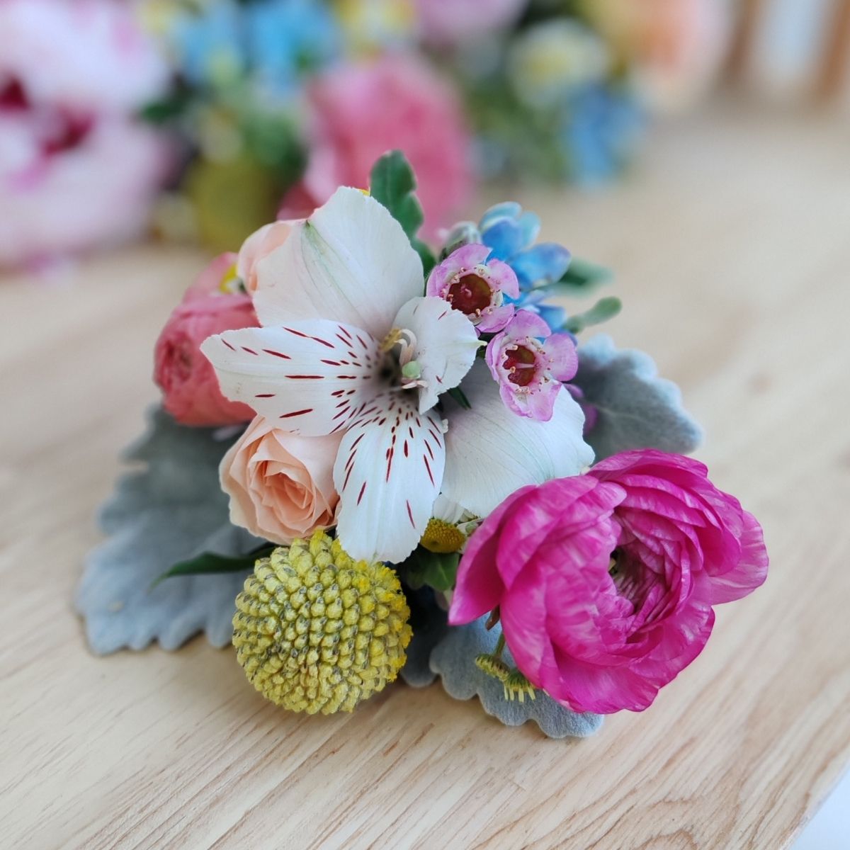 Groom boutonniere billy button ranunculus colourful flowers Singapore