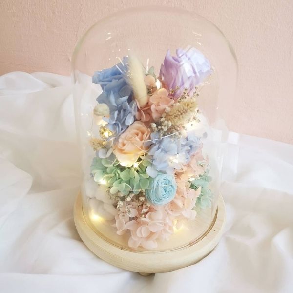 Preserved flower bell jar made at Fleuriste SkillsFuture WSQ floristry course Singapore