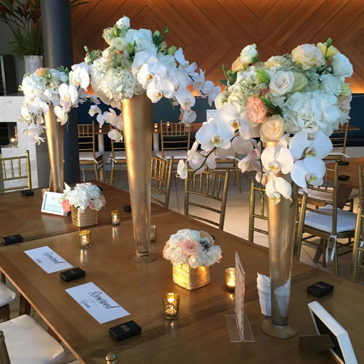 Sentosa luxe tall gold wedding table centrepiece white roses phalaenopsis orchids Singapore