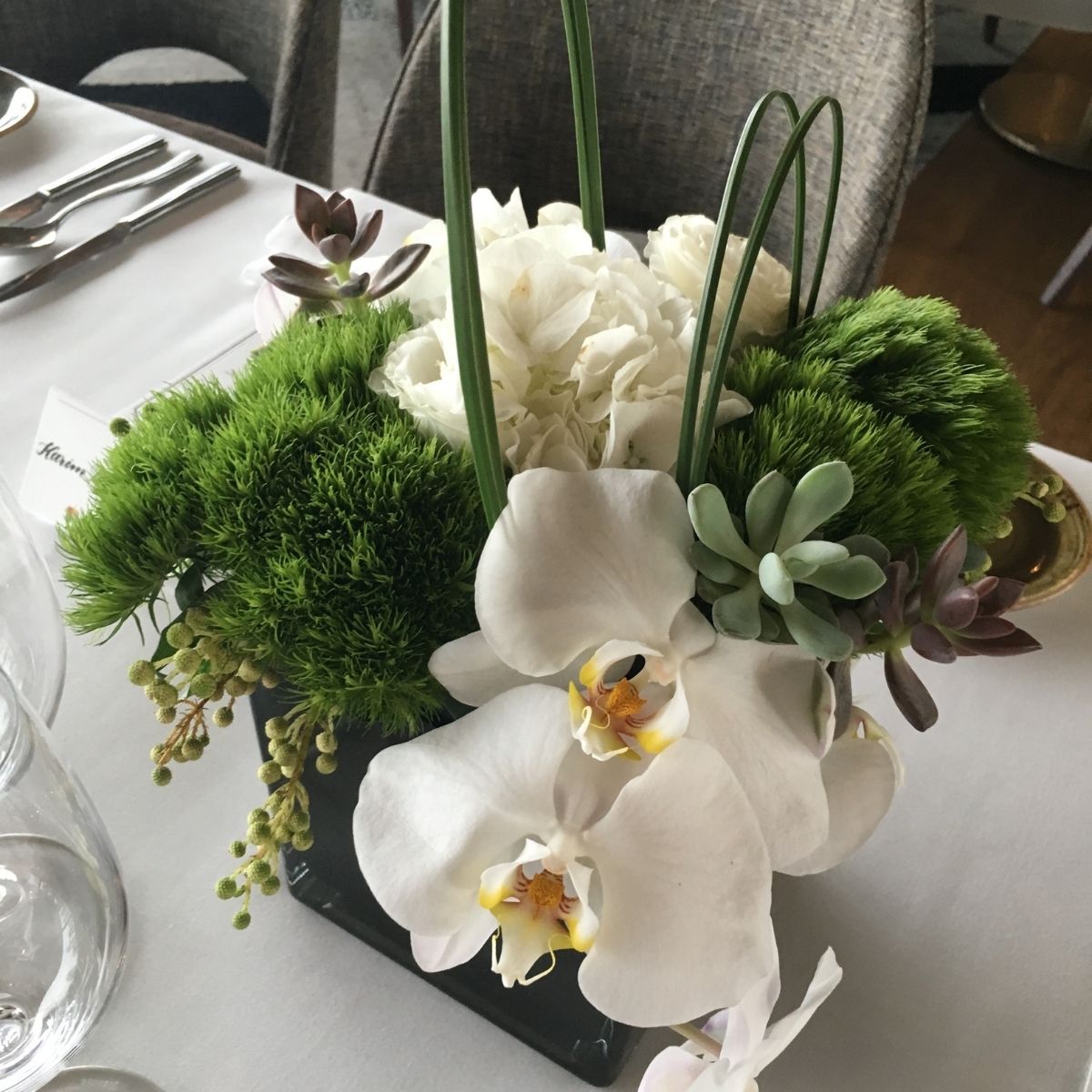 Simple elegant green white wedding centrepiece Singapore Fleuriste
