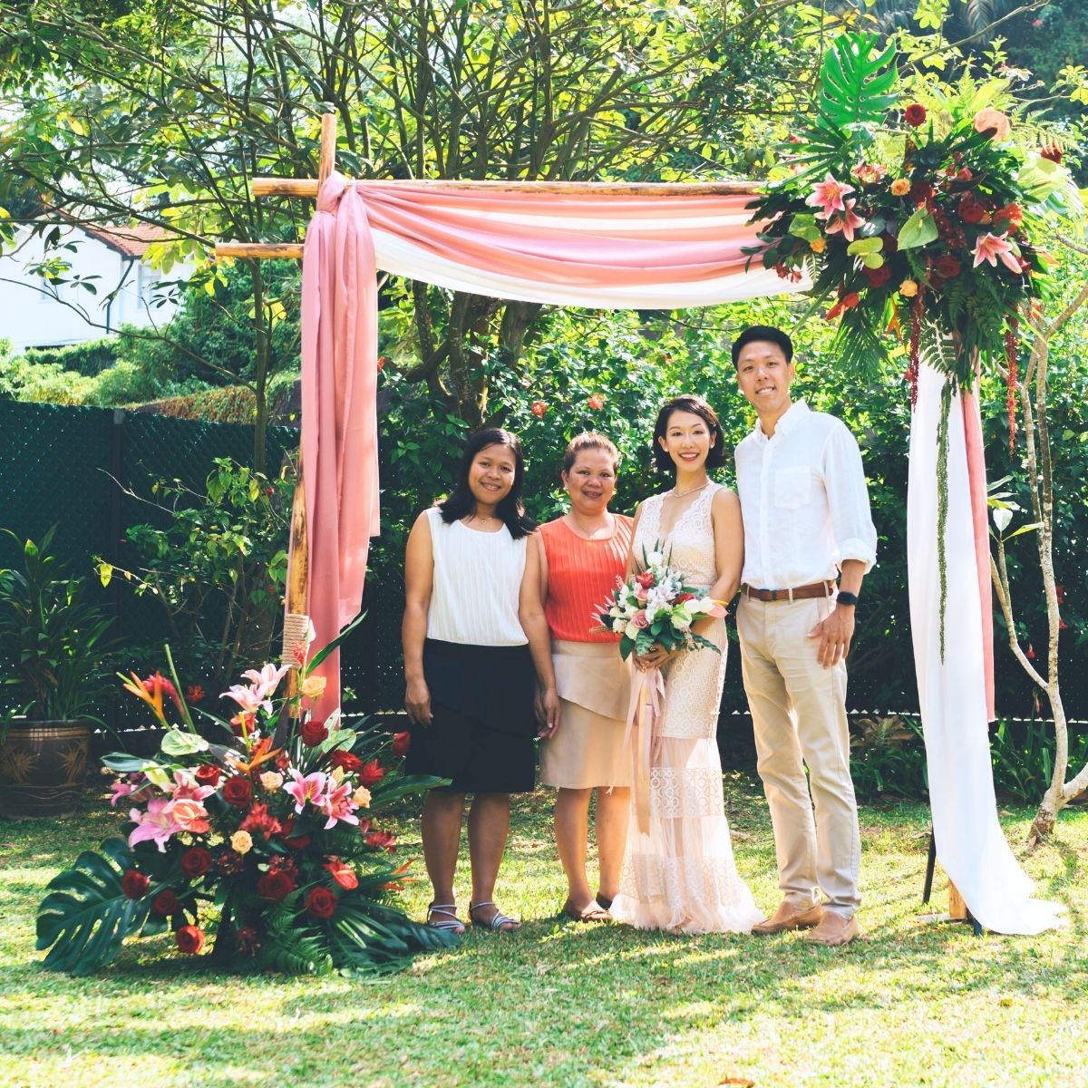 Tropical arch drapes private home wedding intimate venue styling floral installation roses Singapore
