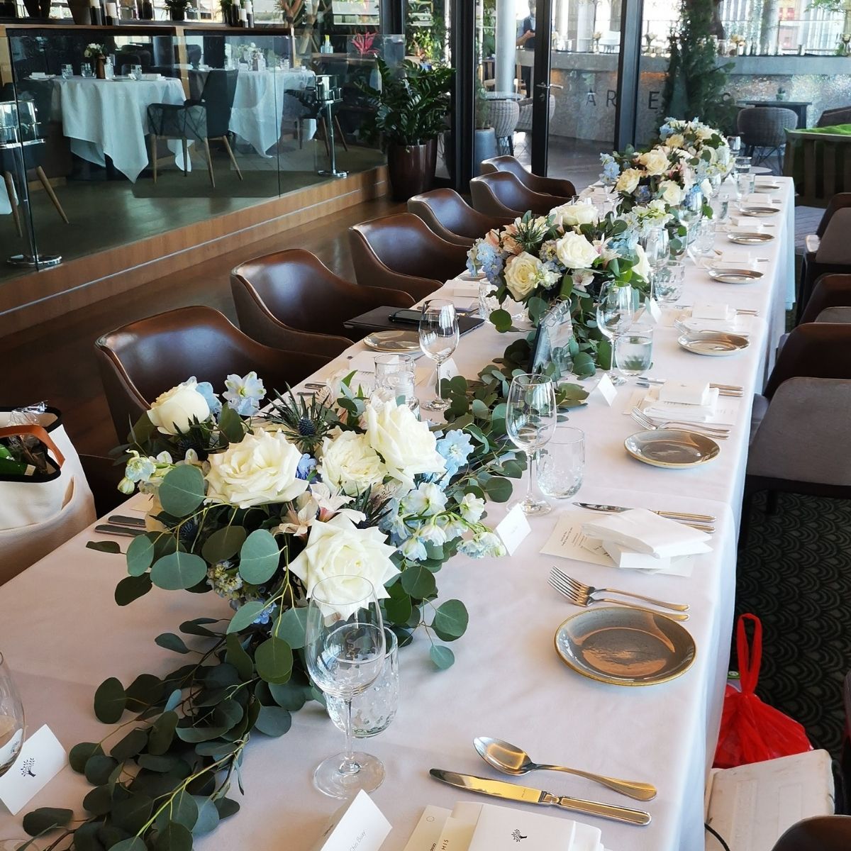 Wedding centrepiece long low arrangement garland Singapore Fleuriste